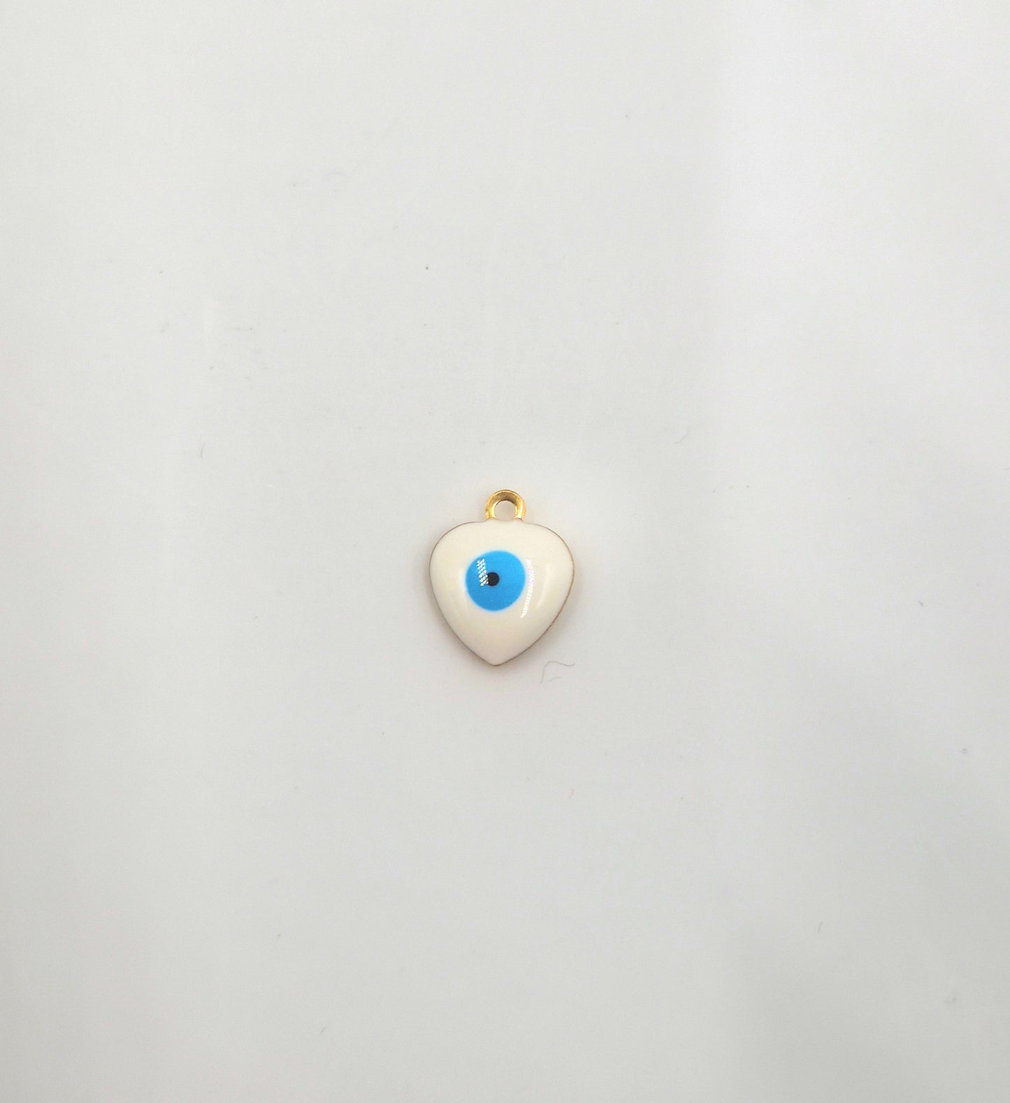 Charm mini Coeur Oeil maléfique doré