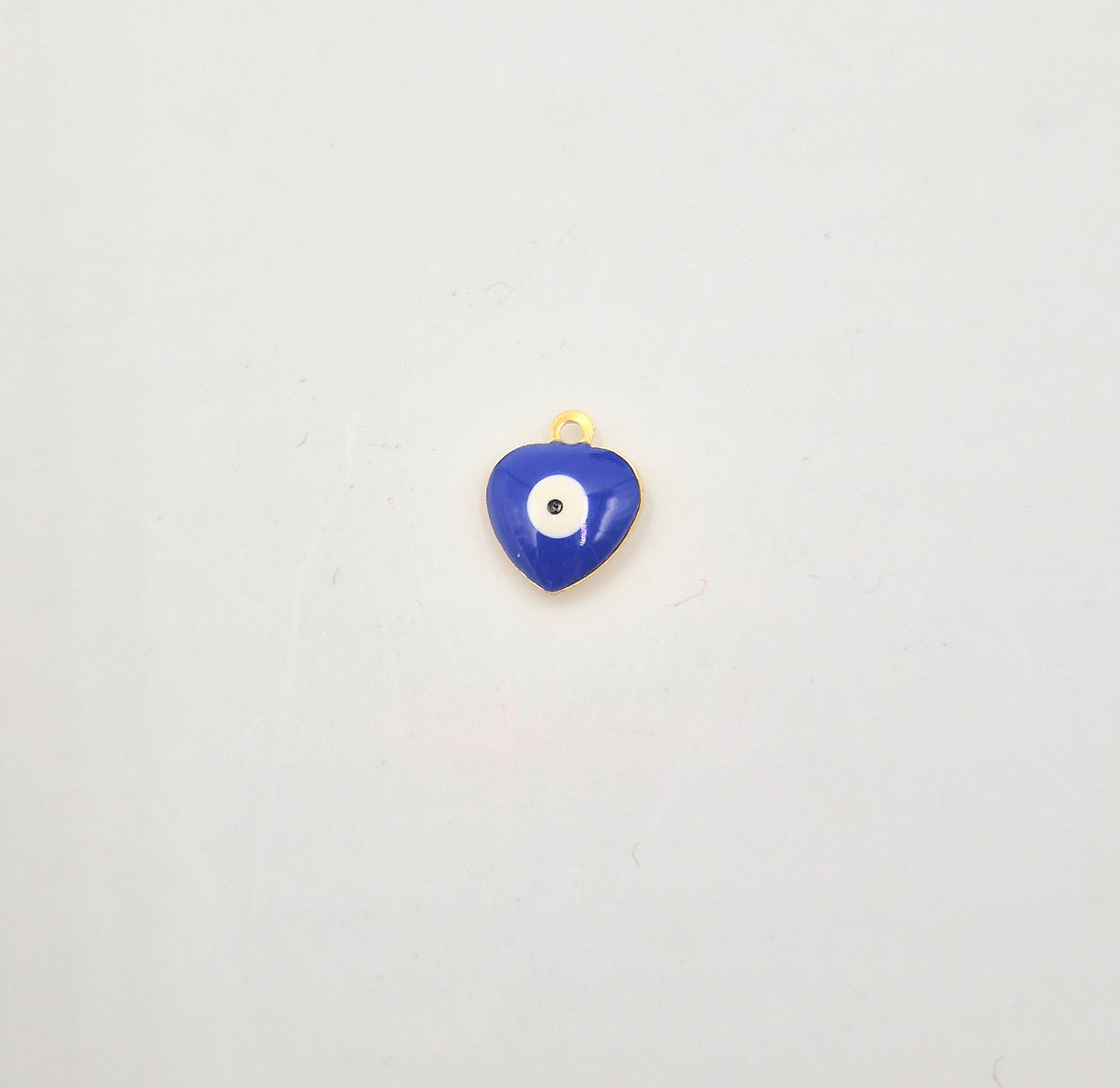 Charm mini Coeur Oeil maléfique doré