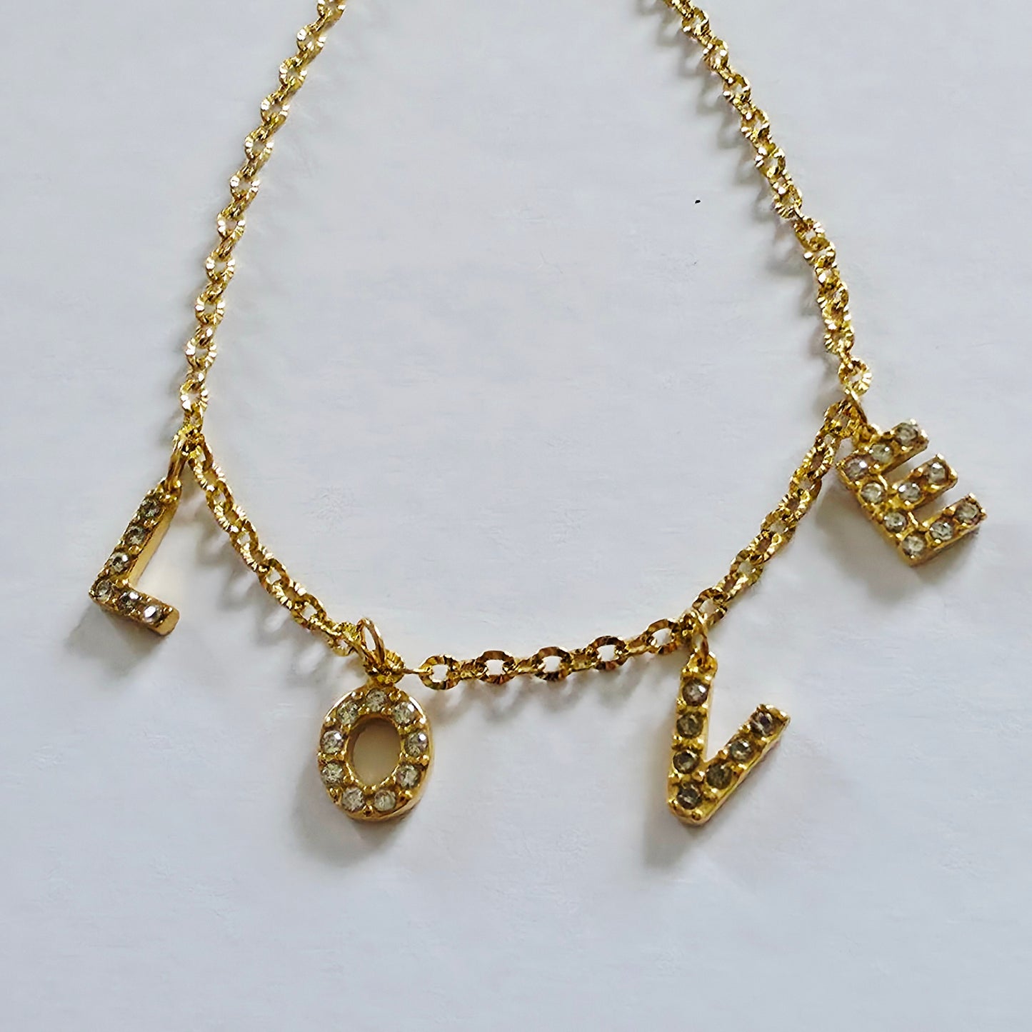 Charm Initiale doré strass