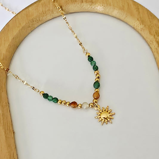 Collier perle médaillon Soleil